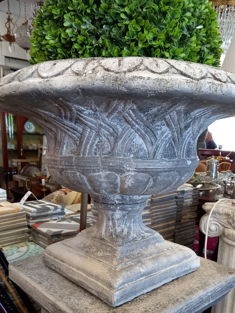 Pair of Urns on Plinths