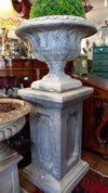 Pair of Urns on Plinths