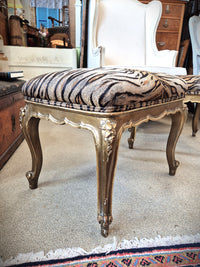 Gilt stools with animal print